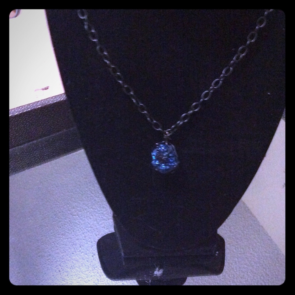 Handmade,  blue topaz necklace with black chain.